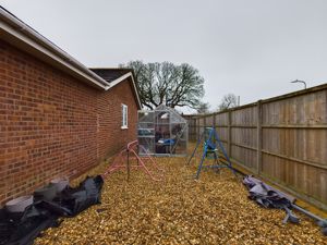 Side gravelled space- click for photo gallery